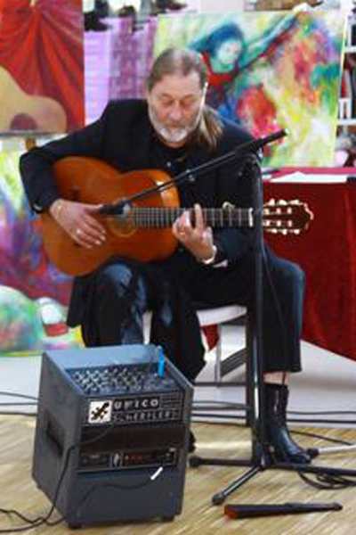 Flamencoguitarist i Flamenco de Colores