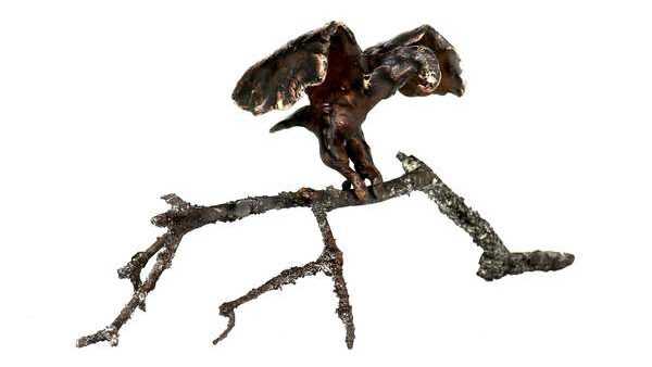 Cire perdue st&oslash;bt &oslash;rn der sidder p&aring; en bronzest&oslash;bt gren